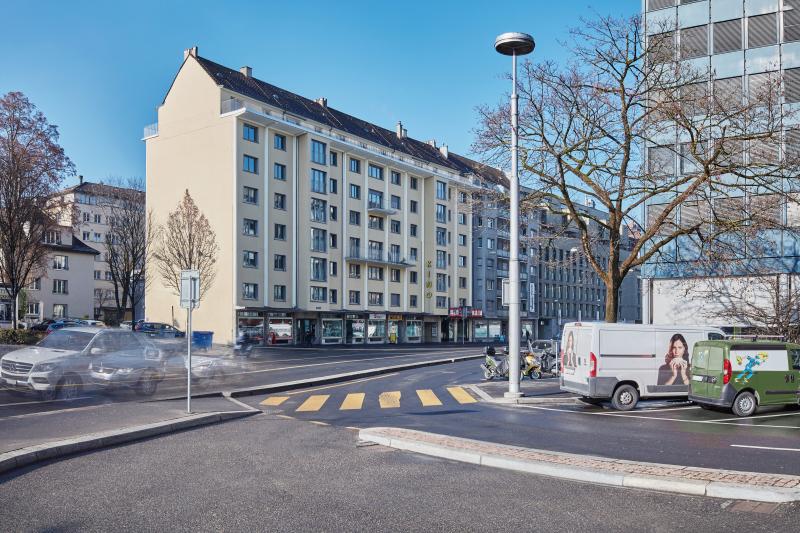 Saniertes Mehrfamilienhaus von 1951 in der Luzerner Innenstadt mit Erdgeschoss-Laden und Wohnungen.