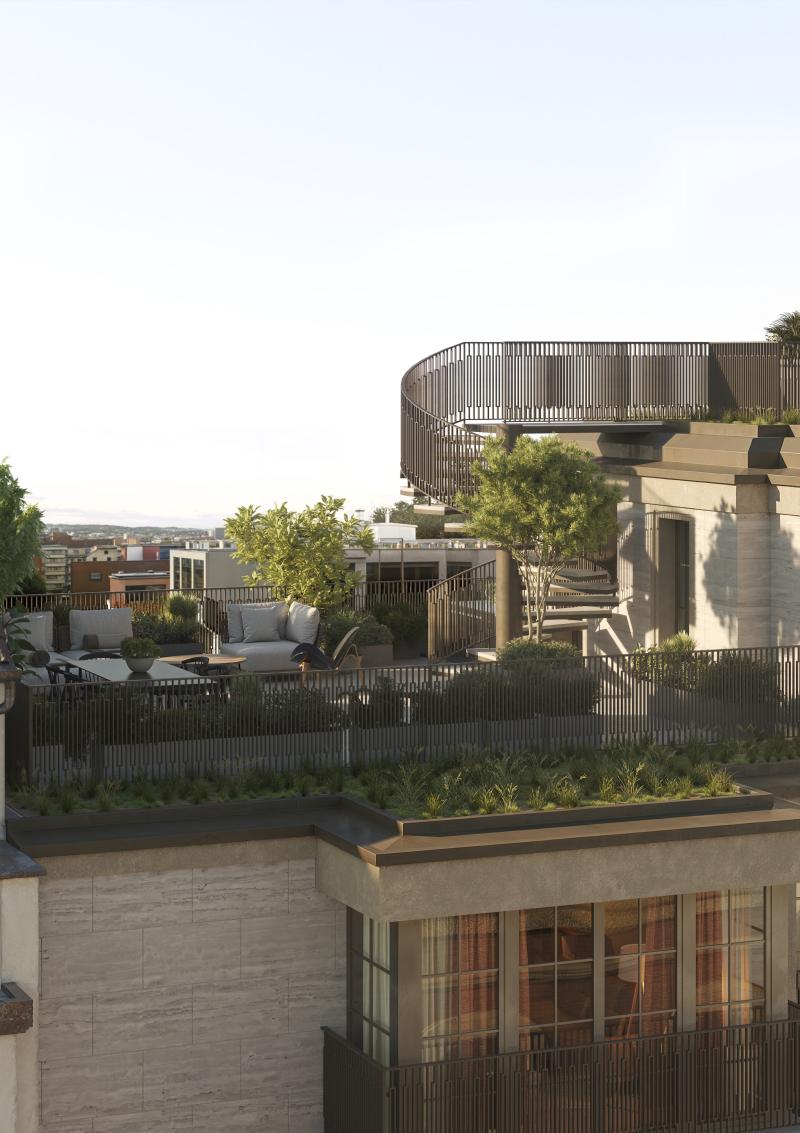 Dachterrasse eines Mehrfamilienhauses in der Weltistrasse mit Sitzplätzen und Bepflanzung.
