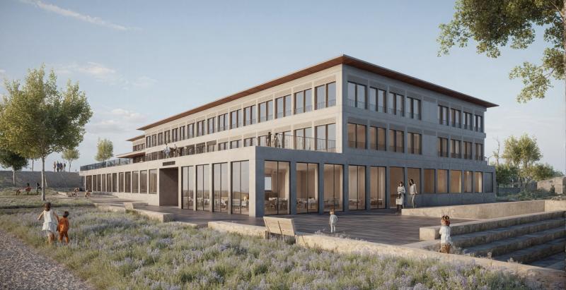 Neubau der Schulanlage Seefeld in Arbon mit länglichem kompaktem Volumen und gestufter Terrassierung.